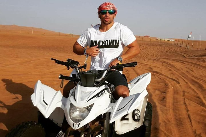 Experience the stunning red sand dunes of Dubai while mastering your ATV skills. Glide across the landscape and capture picturesque moments along the way—an unforgettable adventure awaits.